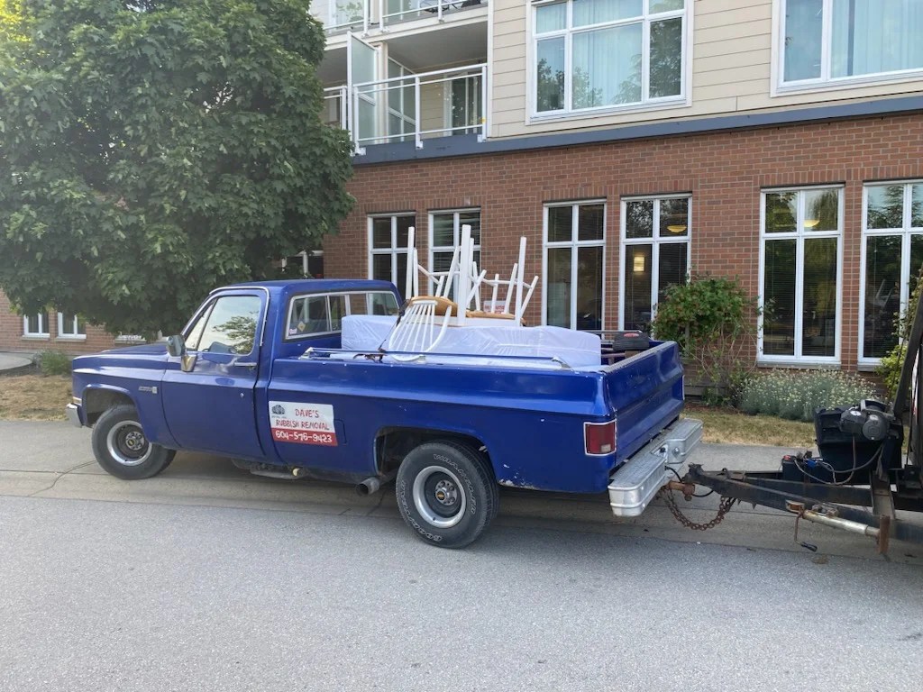 Dave's blue rubbish removal truck