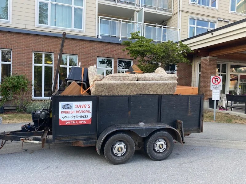Dave's rubbish and junk removal trailer loaded with furniture